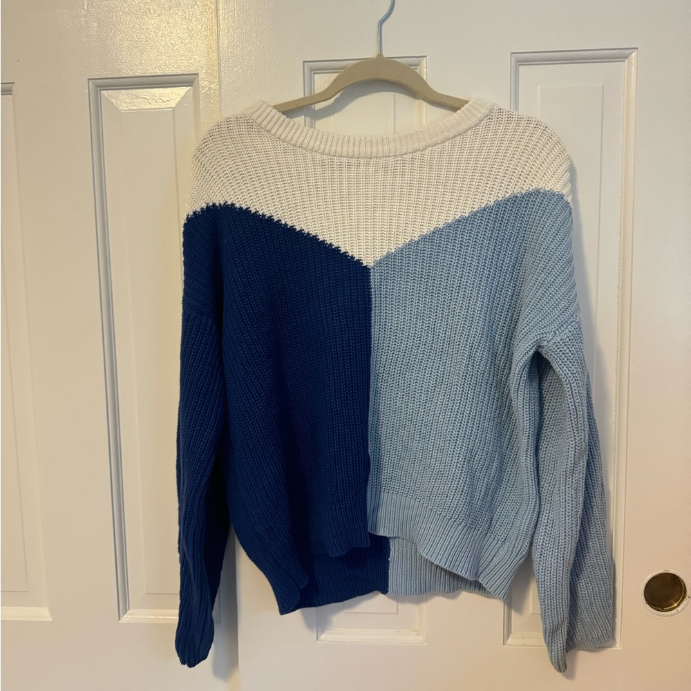 Blue and white color block sweater